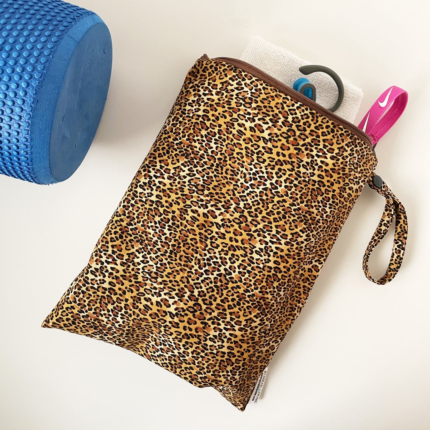 Cheetah print small premium wetbag with gym accessories