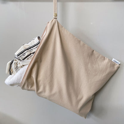 Large wetbag with towel and swimsuit